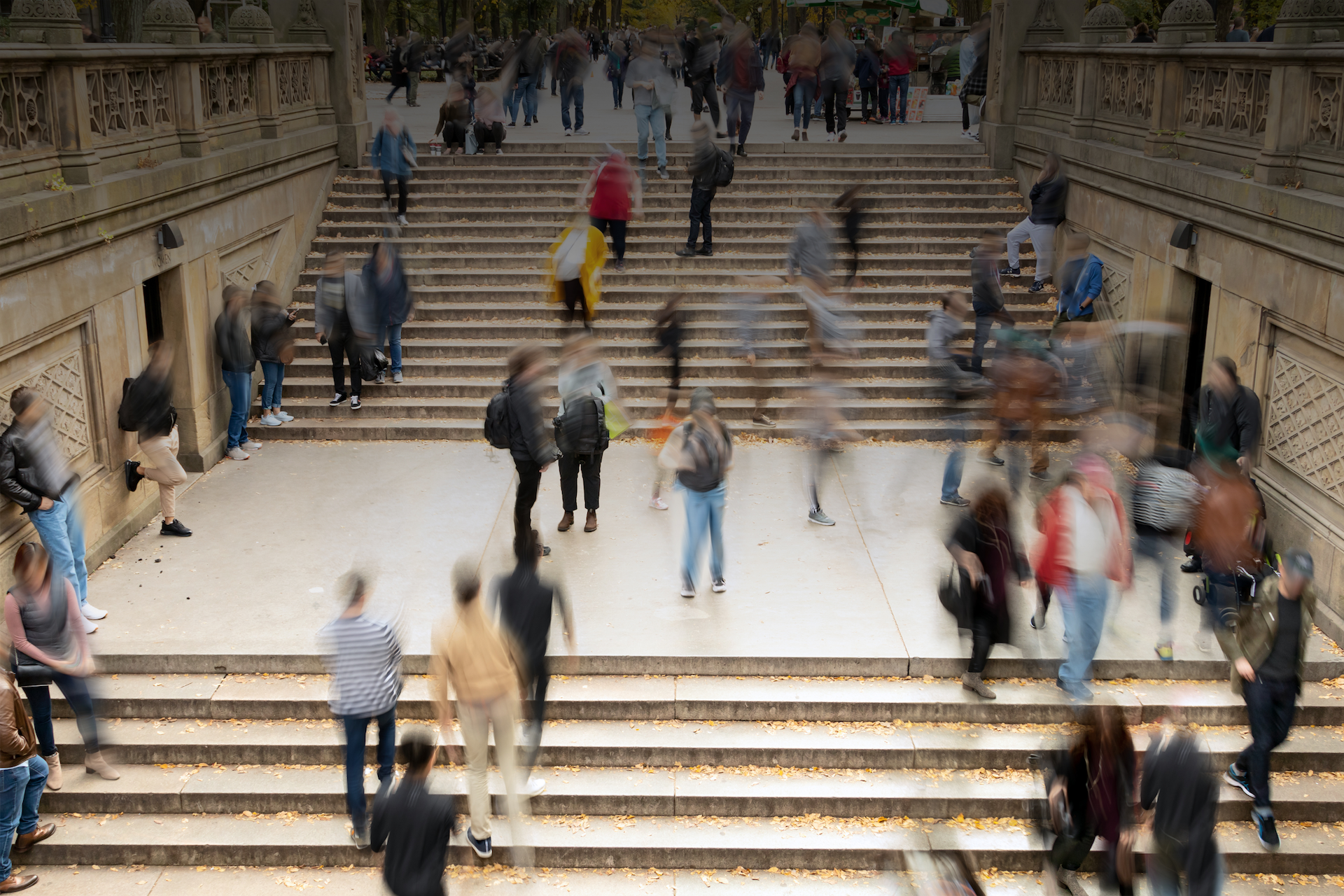 People rushing around in busy city centre